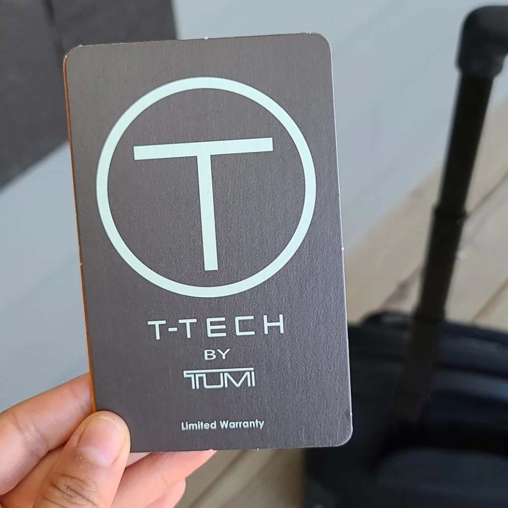 7/1  TUMI T TECH ROLLER